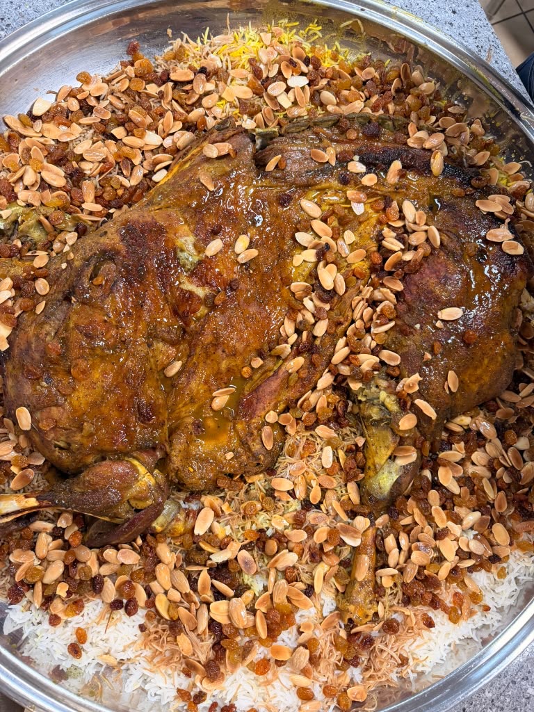 Lamb platter with almonds and raisins